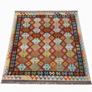 pakistani tribal kilim (5x7 feet) in terracotta, emerald & indigo